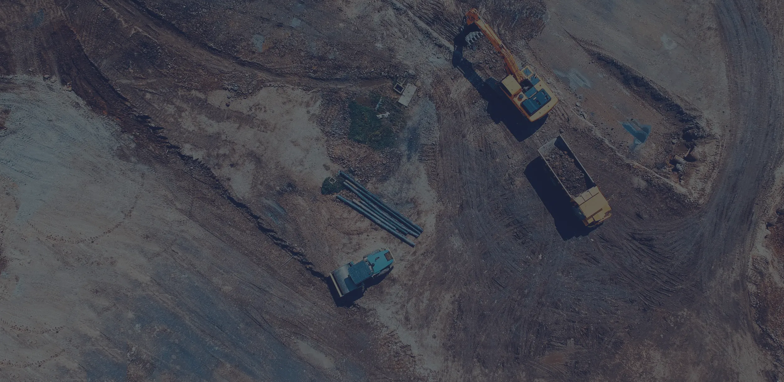 Heavy equipment performing soil testing for environmental site assessment